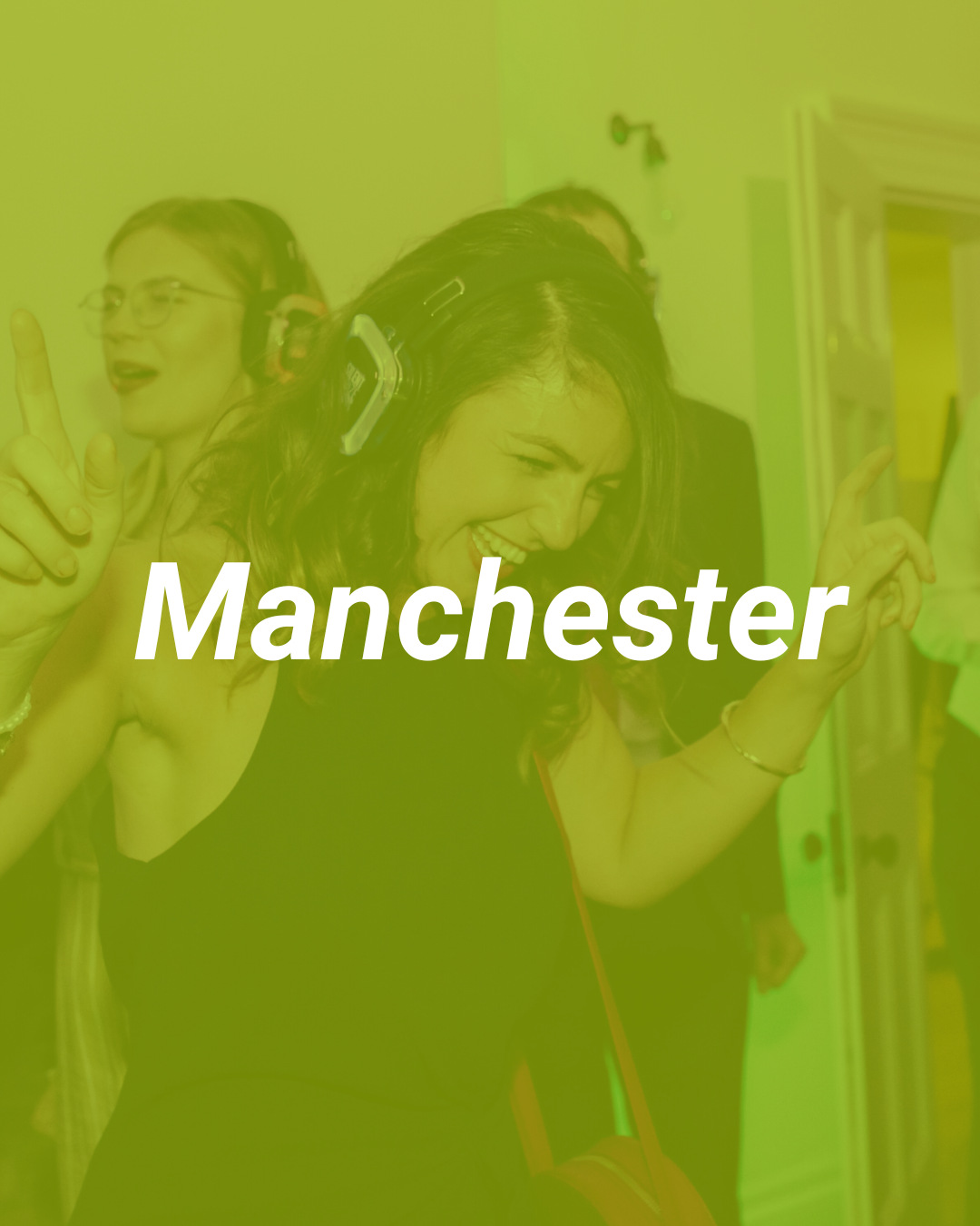 Group of young people dancing and enjoying music at a party or club in Manchester.