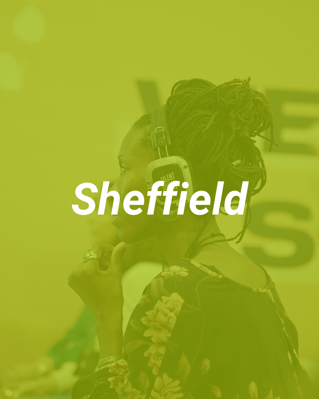 A woman with dreadlocks wearing headphones, posing in an indoor setting with a green overlay.