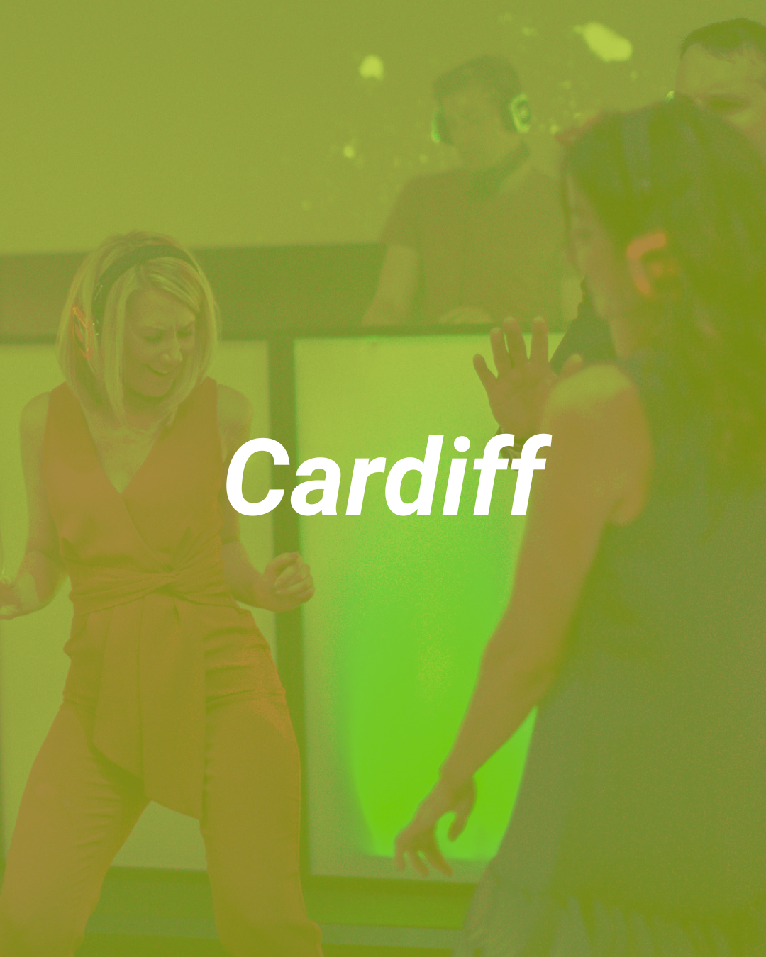 People dancing and having fun at an event in Cardiff