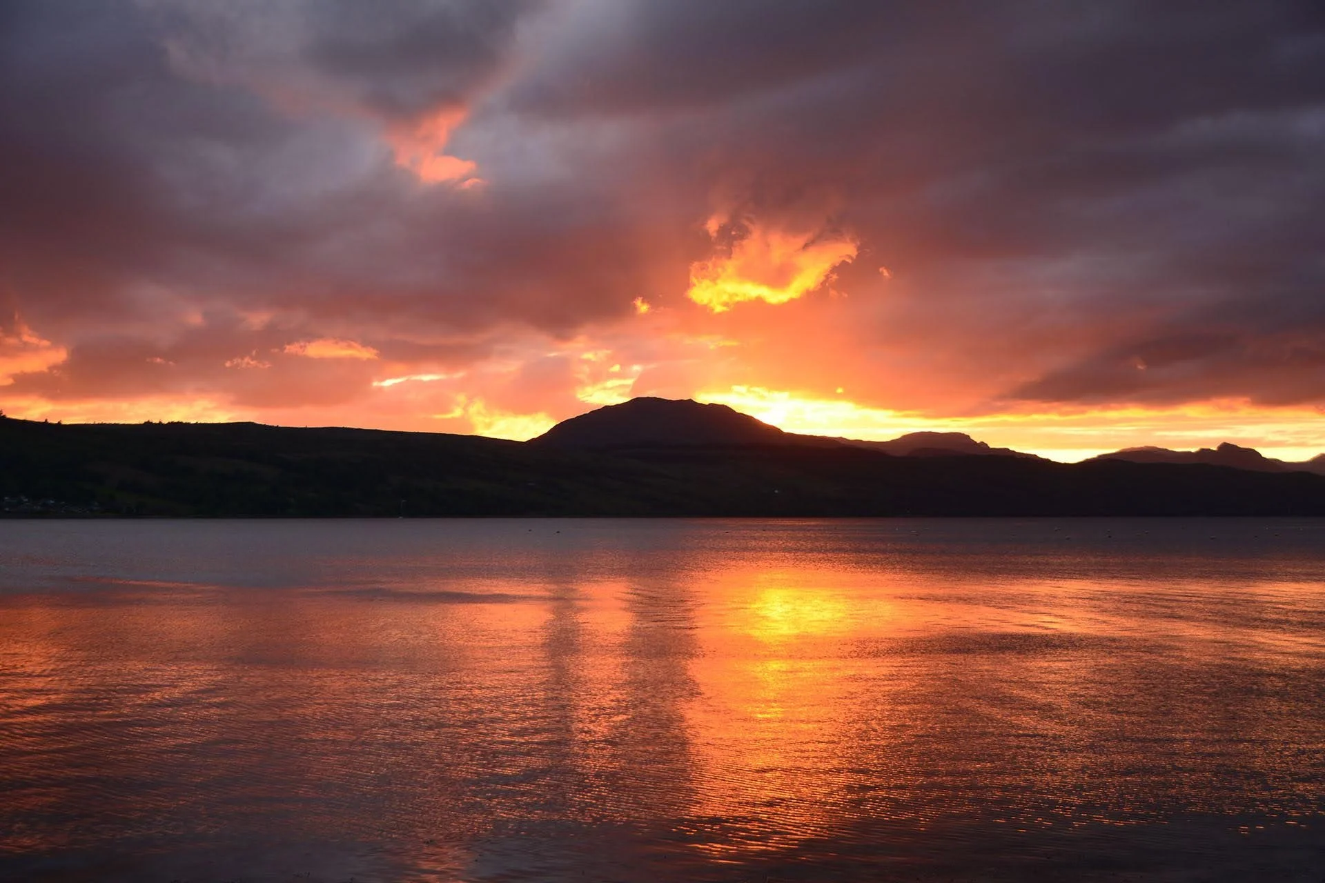 My happy place...surrounded by mountains and sea. Sometimes blessed with explosive colour.