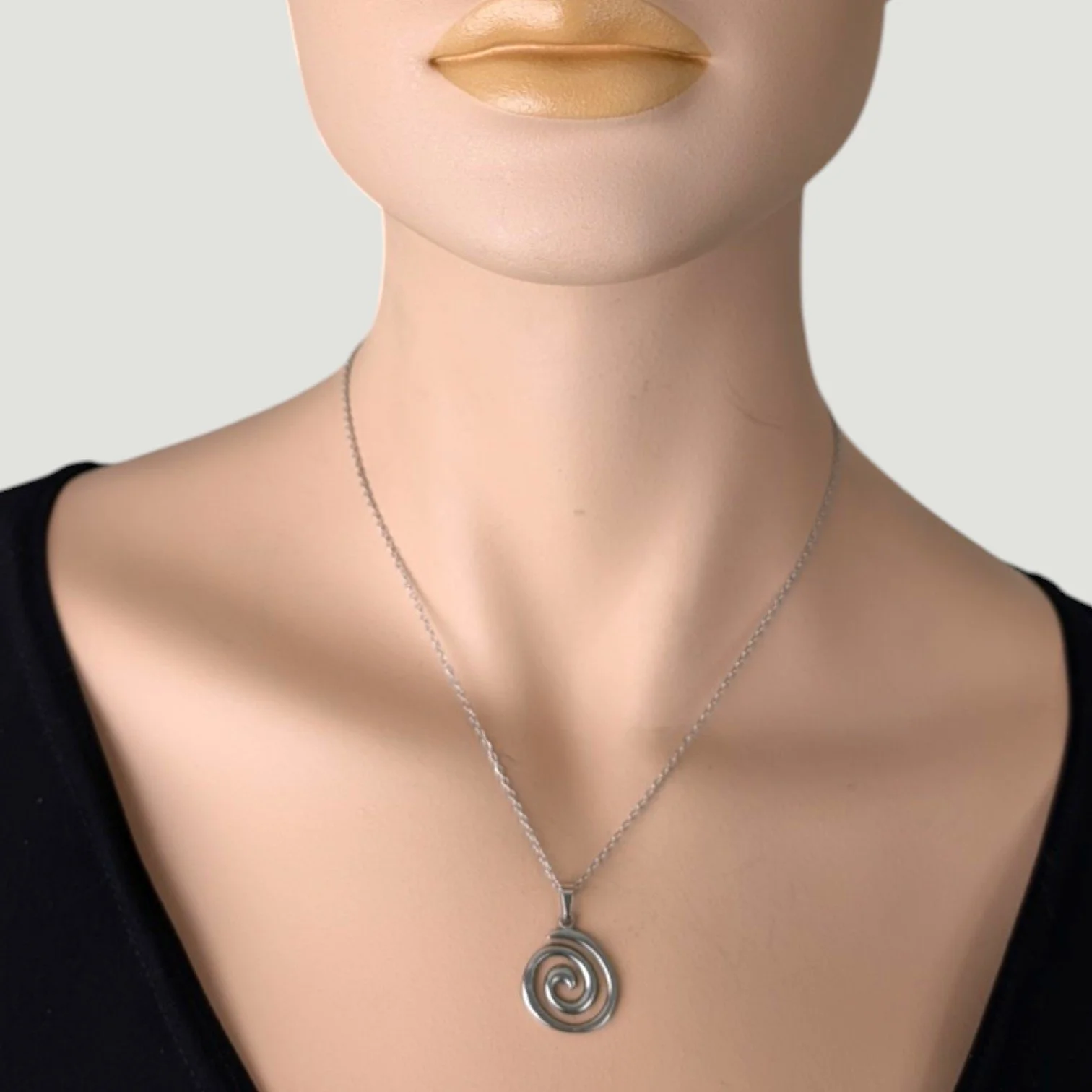 vortex spiral stainless steel necklace, silver on mannequin bust