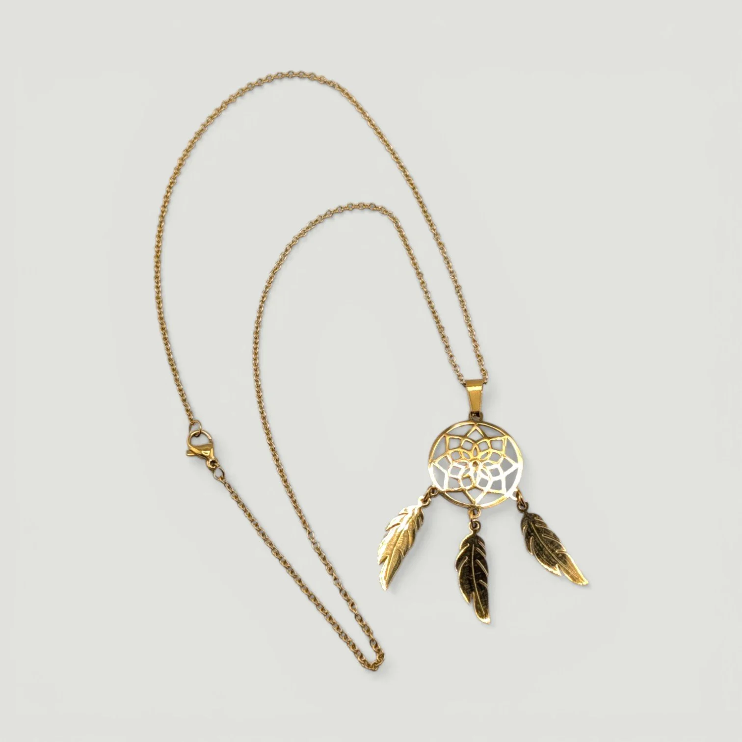 gold stainless steel dreamcatcher necklace full chain, flat lay