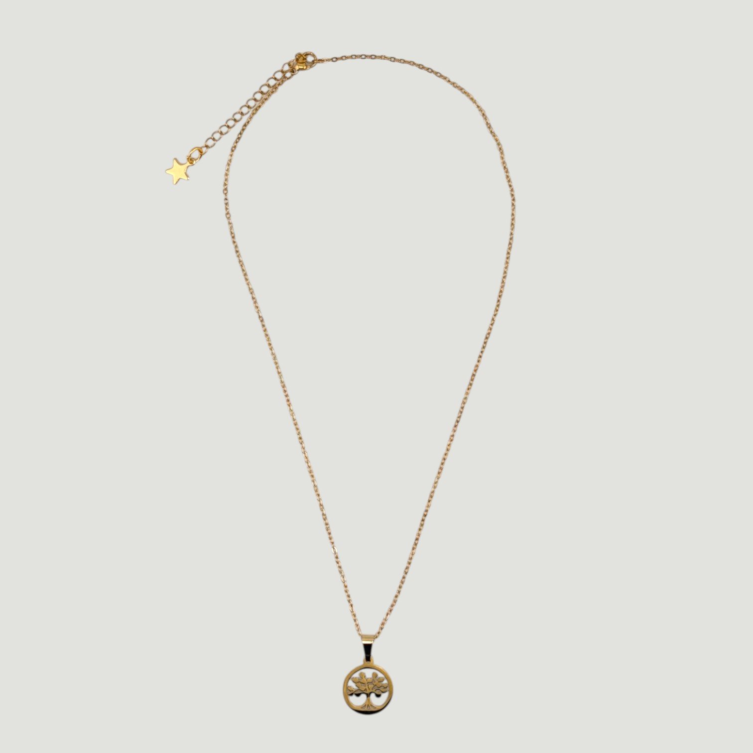 tree of life gold stainless steel necklace full view flat lay