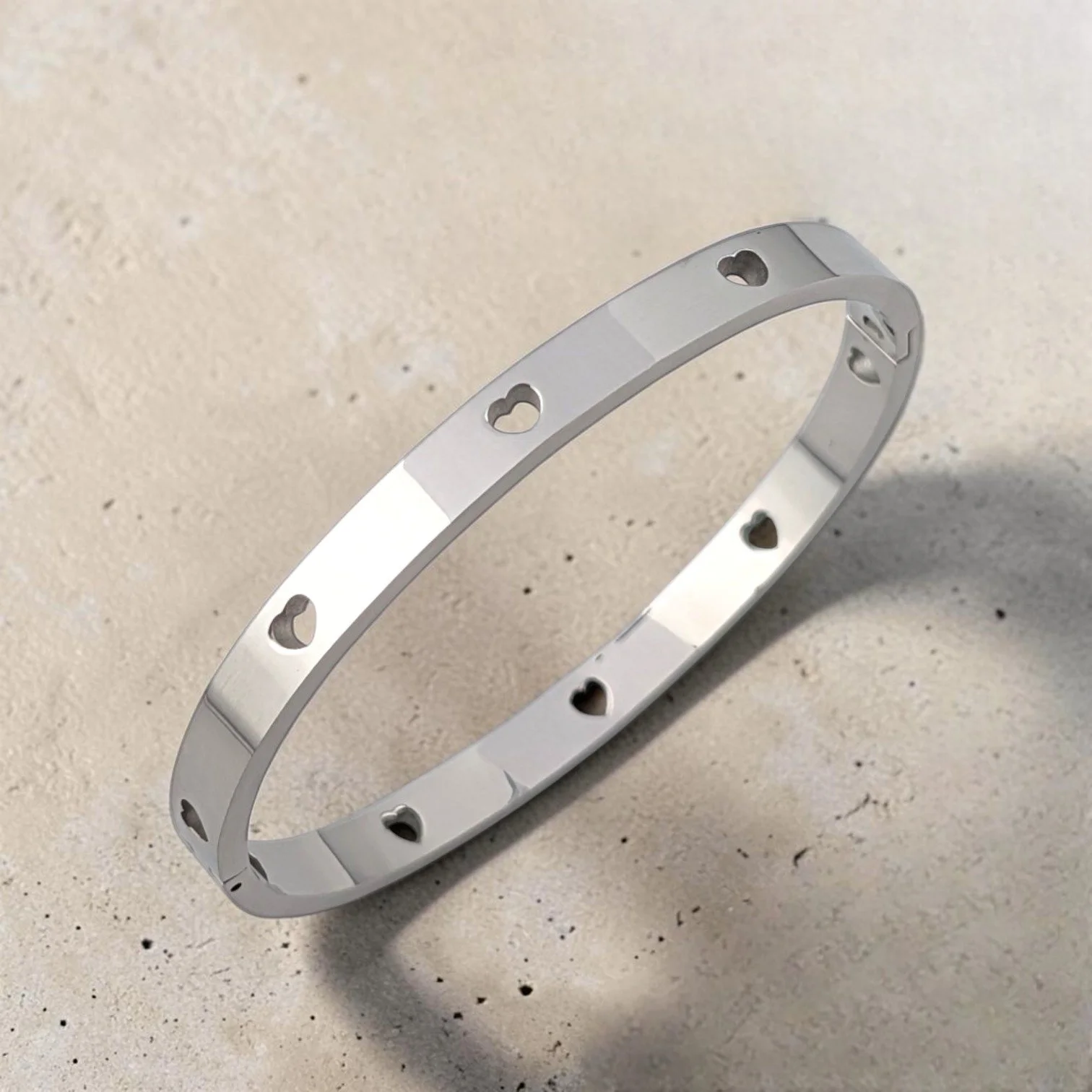 Hollow Hearts Stainless Steel Bangle Bracelet - Silver