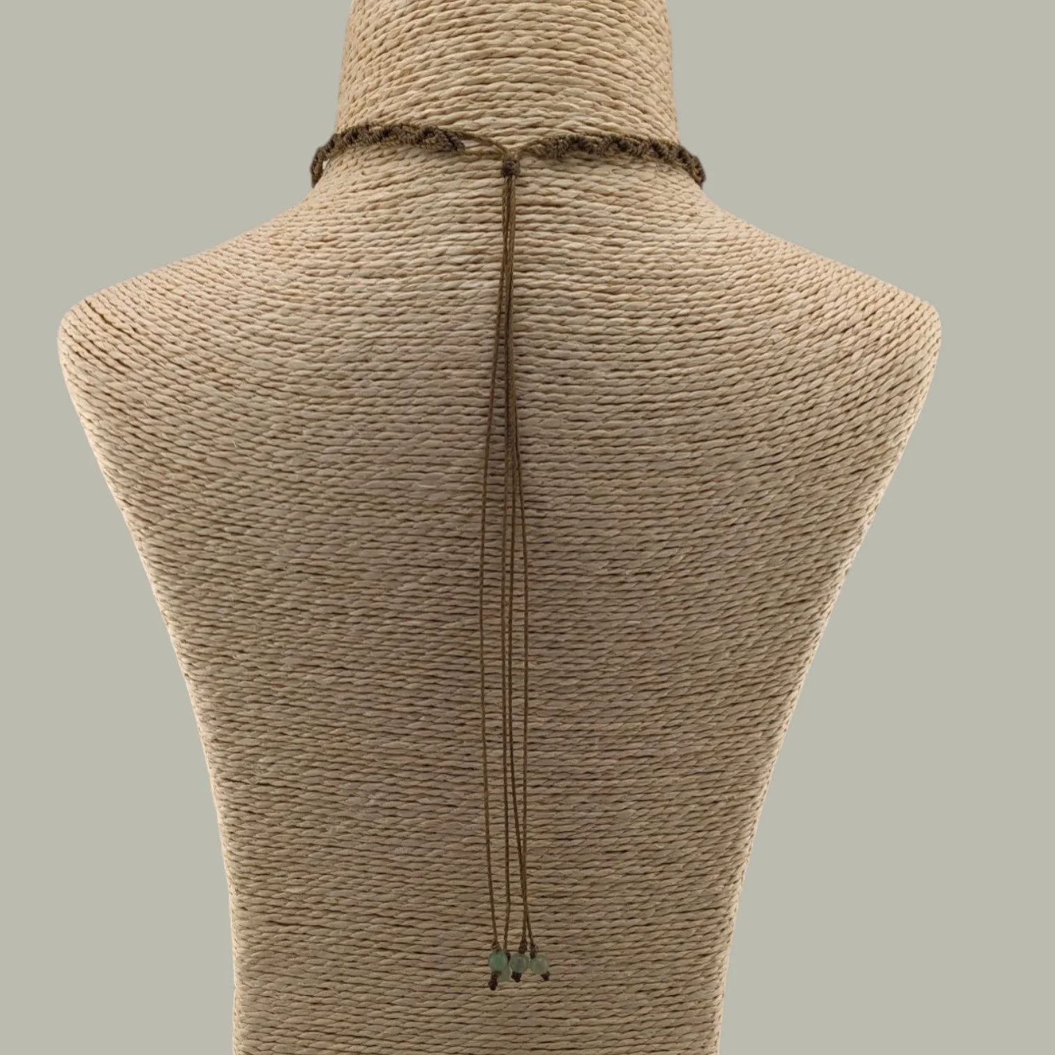 Aventurine macrame western choker necklace flat lay on taupe background