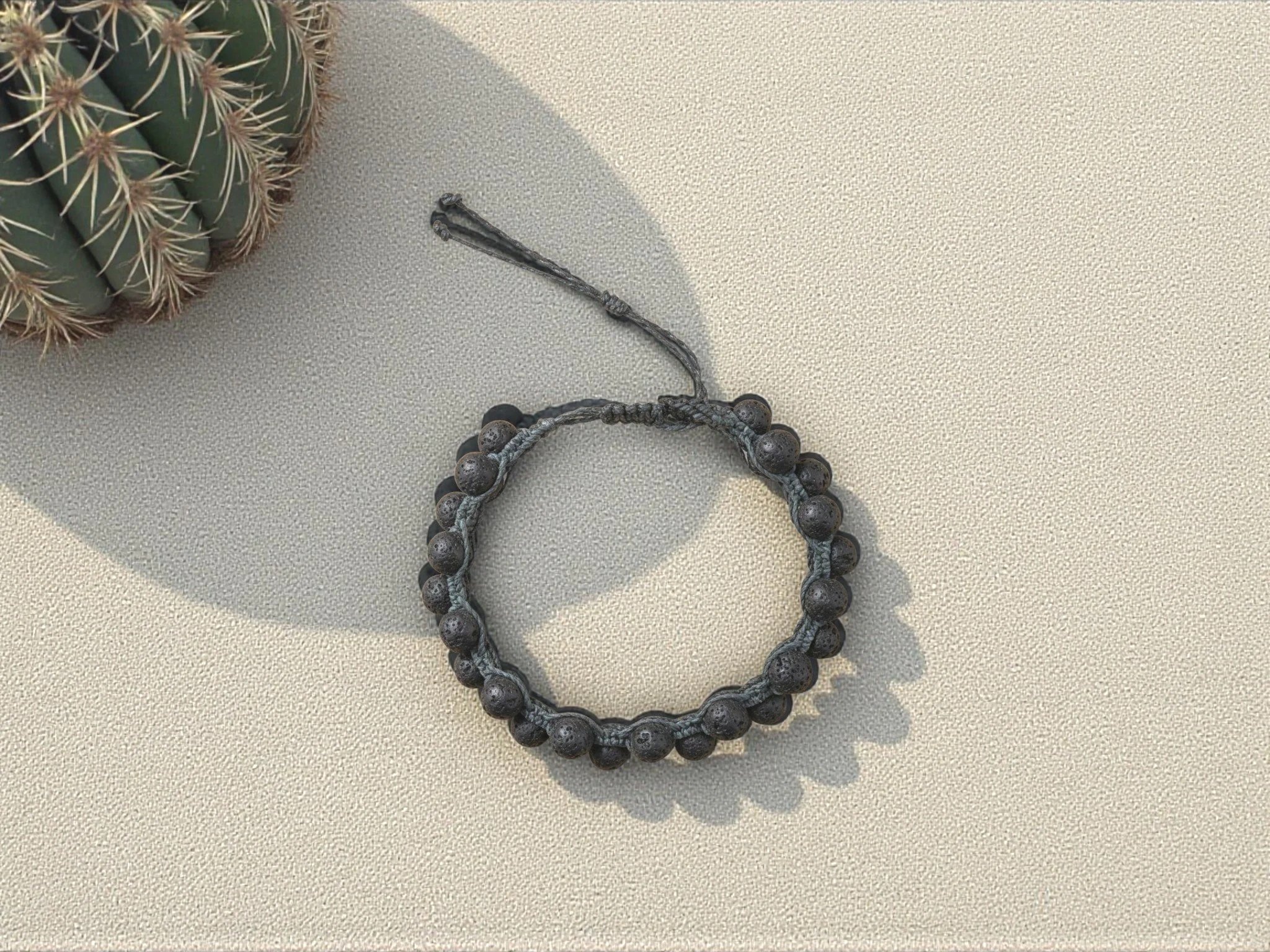 view from above of a hand woven adjustable macramé bracelet for men