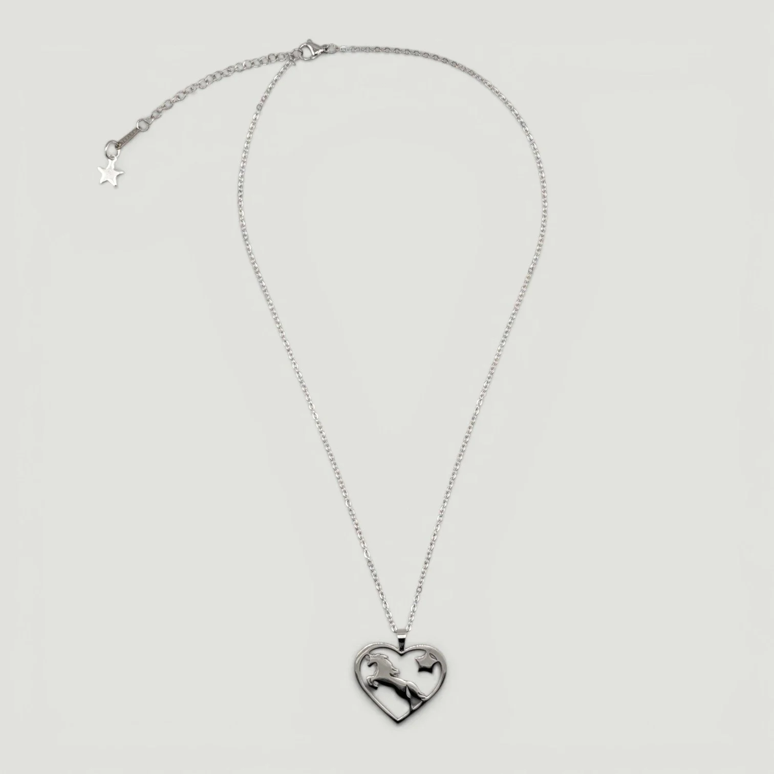 Silver stainless steel horse and heart necklace full chain flat lay