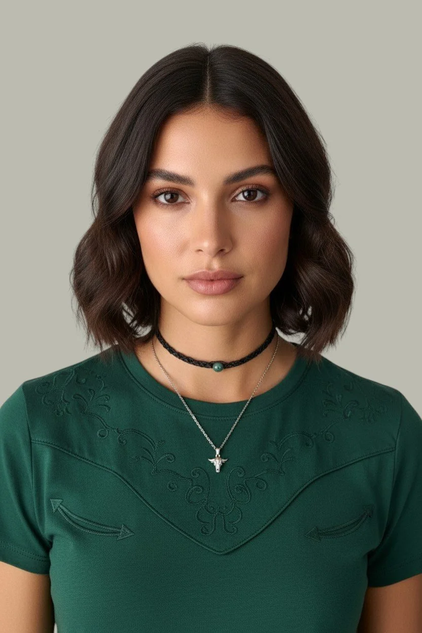 model wearing an aventurine macrame choker layered with a bull skull necklace