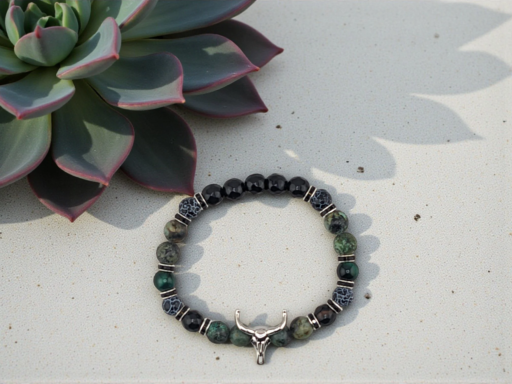 Black and green western gemstone bracelet for men with silver bull skull and black rhinestone spacers