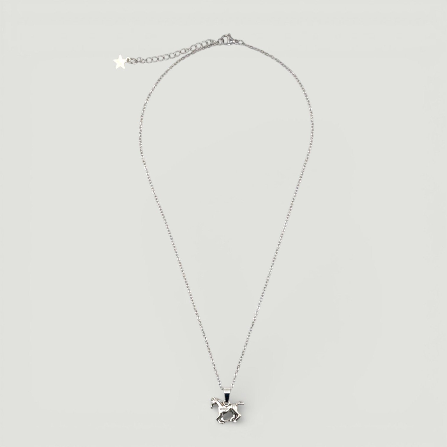 Galloping horse stainless steel necklace full chain flat lay