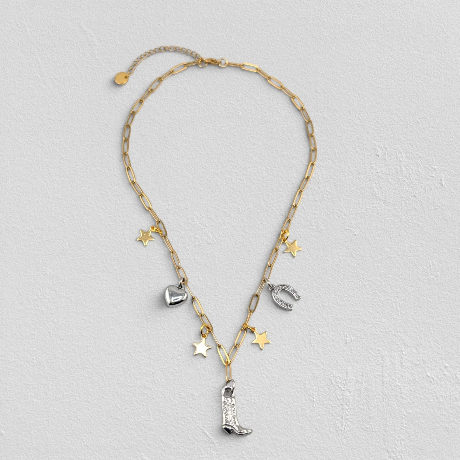 gold cowboy boot stainless steel charm necklace full view flat lay