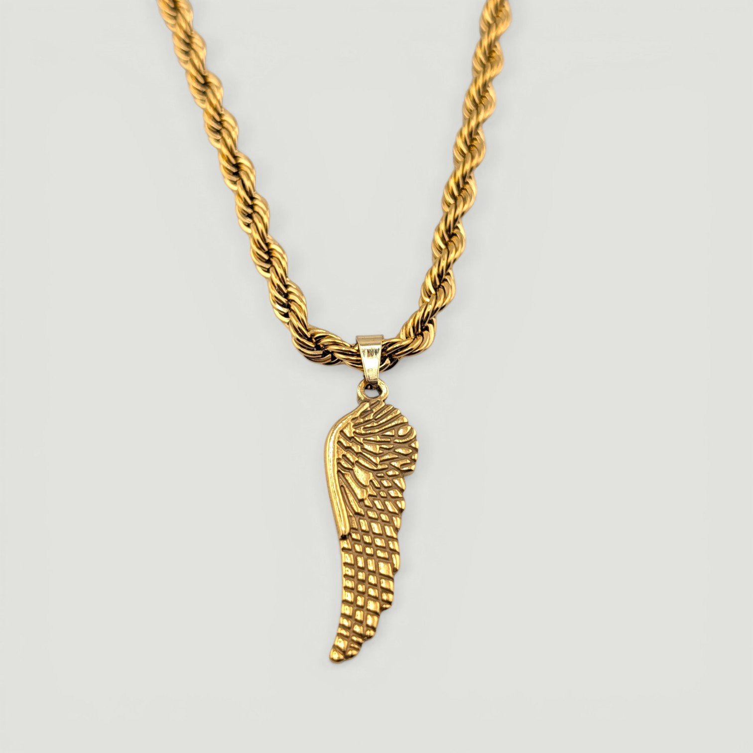 chunky wing gold stainless steel necklace front view close up