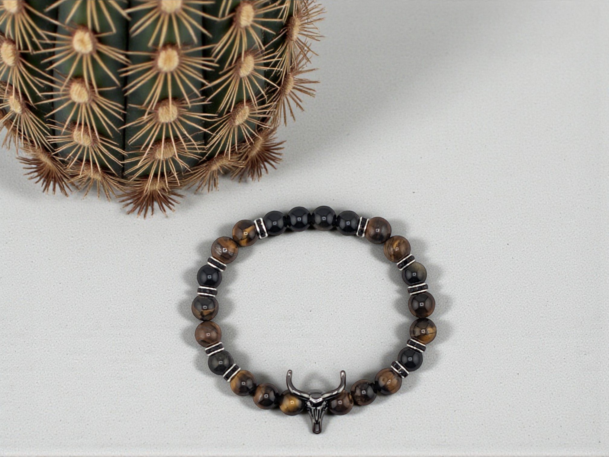 Men's brown and black western bracelet with black bull skull charm