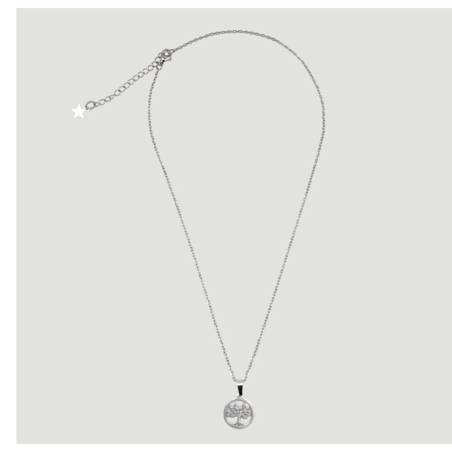 tree of life silver stainless steel necklace full view flat lay