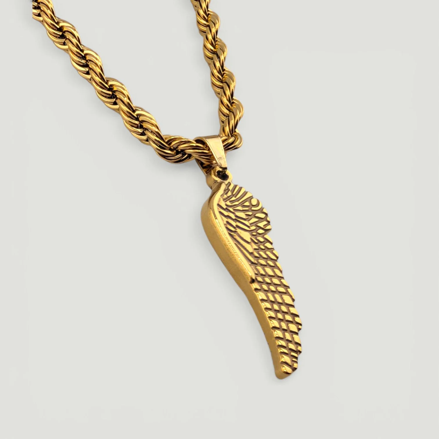 chunky wing gold stainless steel necklace side view detail close up