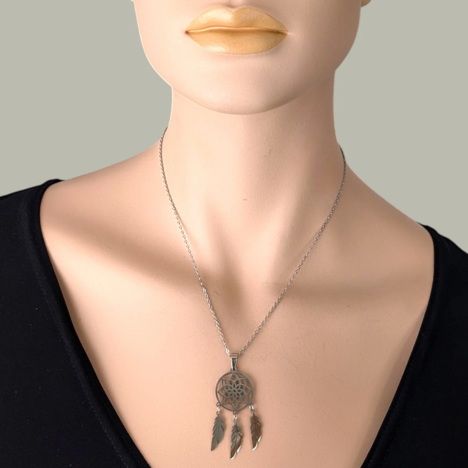 silver stainless steel dreamcatcher necklace on mannequin, close up bust view