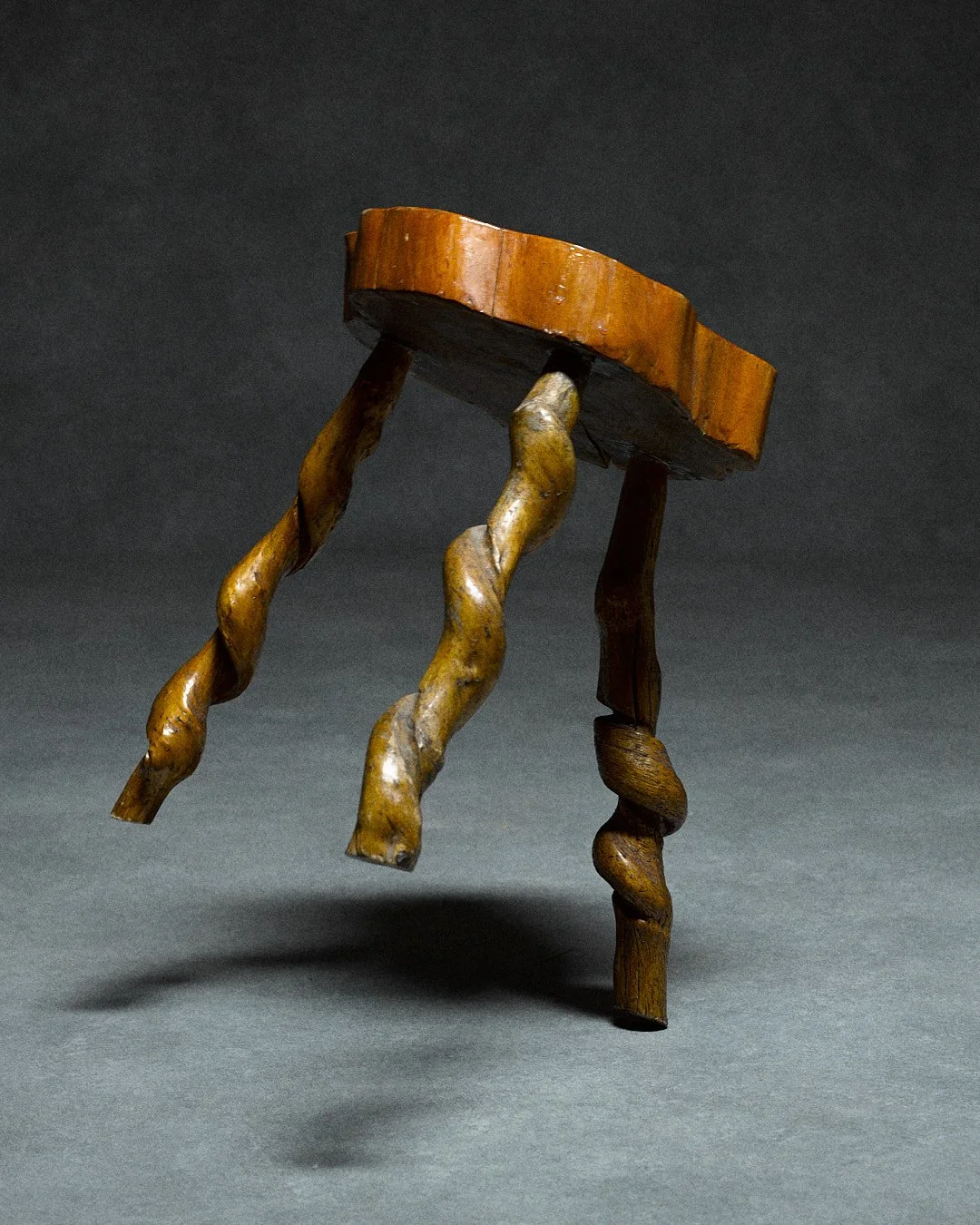 small wooden tripod stool [€95]