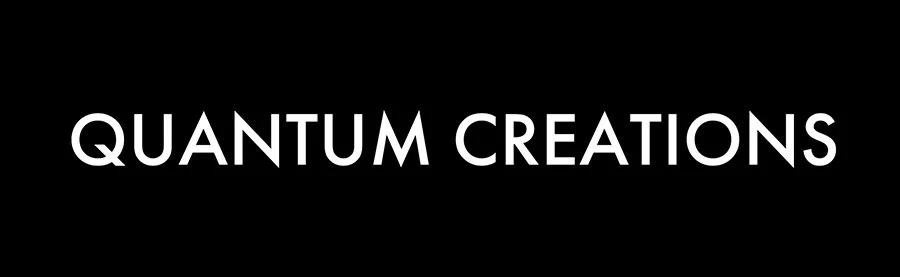 Black background with white text saying 'QUANTUM CREATIONS'