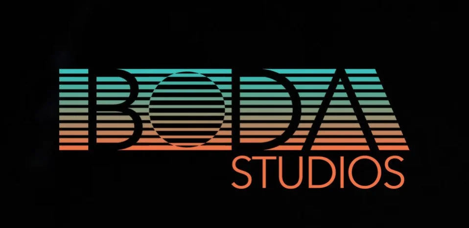 IBOdia Studios logo with horizontal lines in gradient colors on black background.