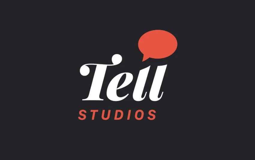Tell Studios logo with a speech bubble on a dark background