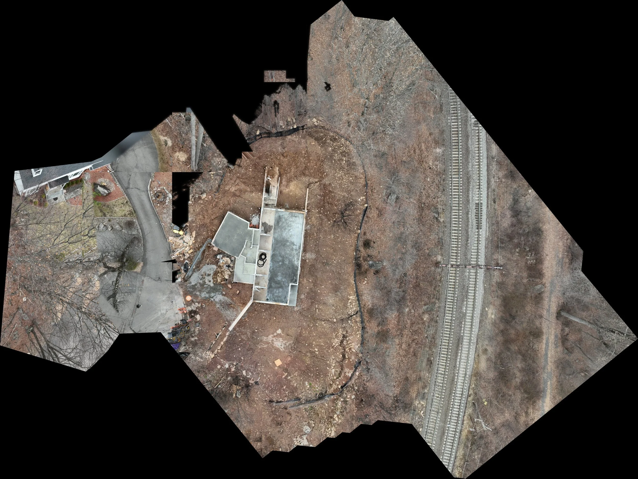 The whole hillside, from the street above to the bottom of the slope