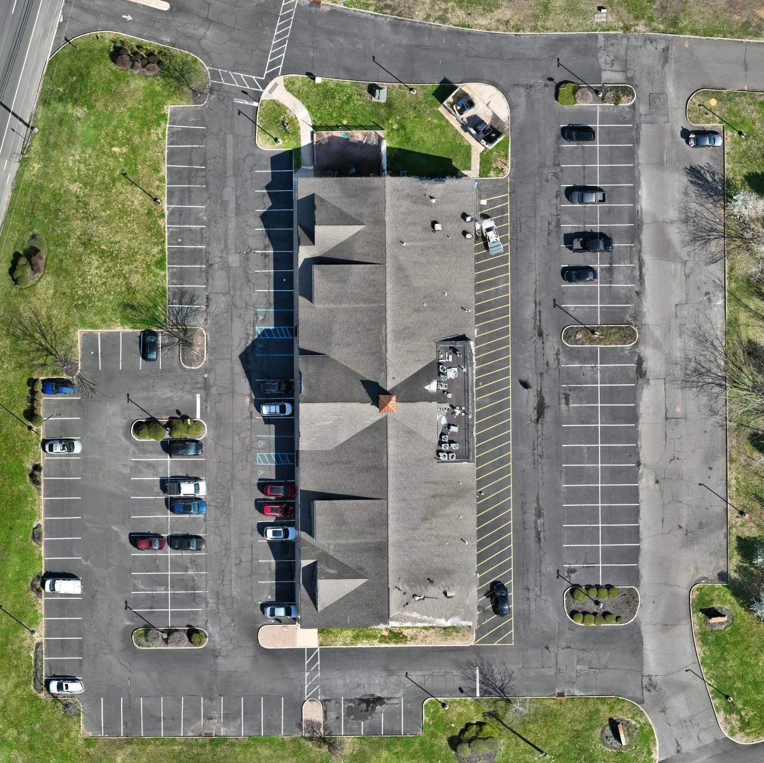 South building, parking, curbs and landscaping