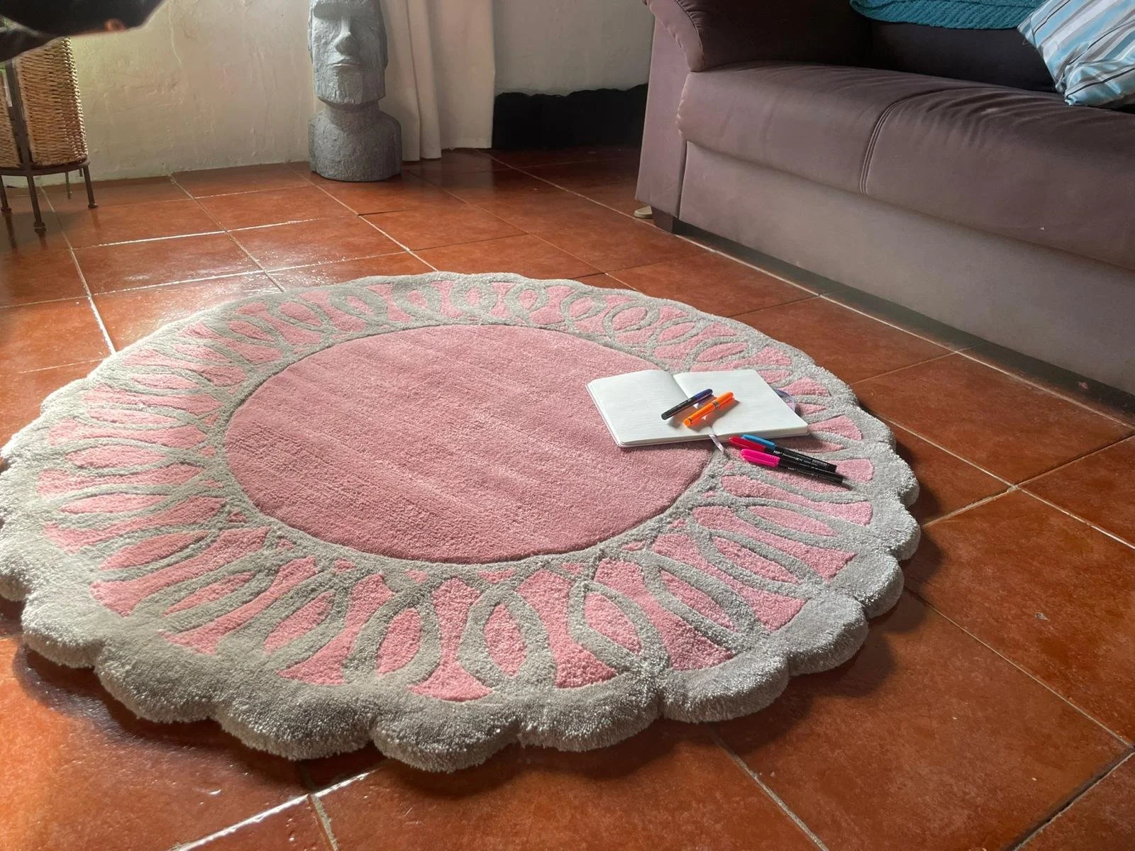 Pink and grey round tufted rug