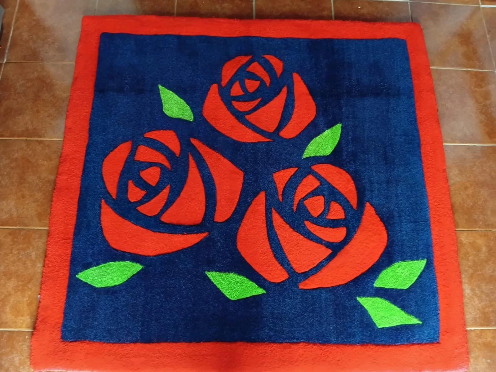 Hand tufted Rose wool rug.