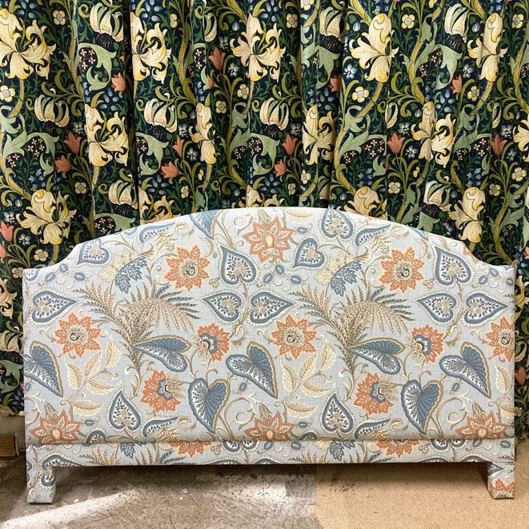Antique headboard.
Found at a flea market by our client, this headboard had all the old padding replaced with new foam and was finished in a striking Iliv fabric supplied by our client.