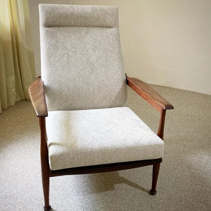 Mid Century Guy Rogers Manhattan recliner chair. 
This chair was completely rebuilt with all new Pirelli style rubber webbing and clips along with new foam for the back and and also for the seat cushion and finished with a Linwood Niva fabric.