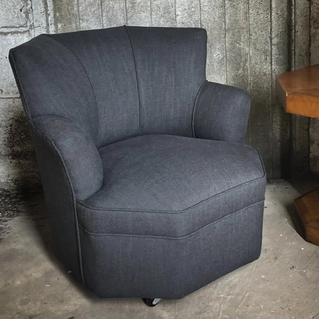An Airborne metal framed octagonal small armchair. Rebuilt with original arm and back pads retained and finished in a Linwood fabric.