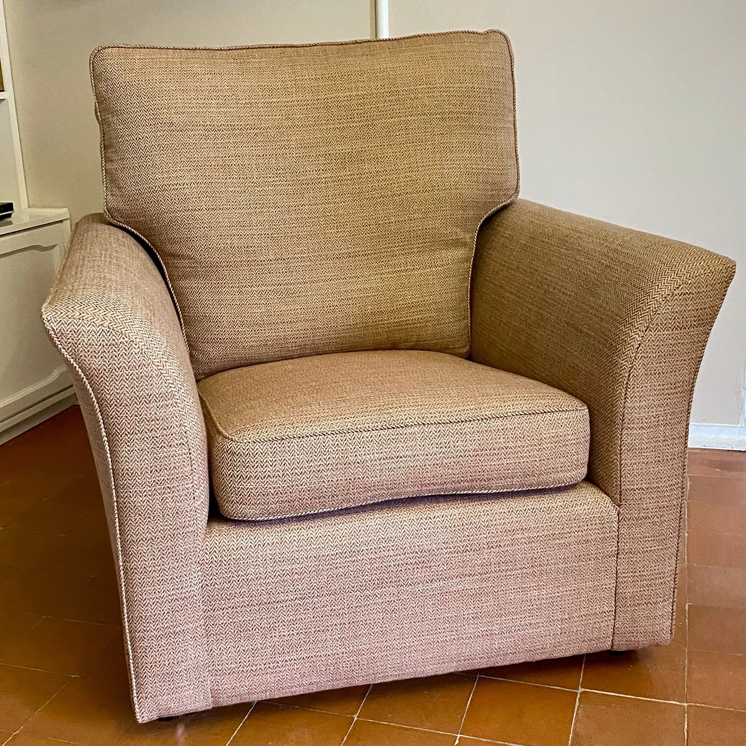 Large Wesley Barrell armchair.
This chair required some internal work including new elasticated webbing and some replacement foam before it was fully recovered in Linwood Leckford fabric.