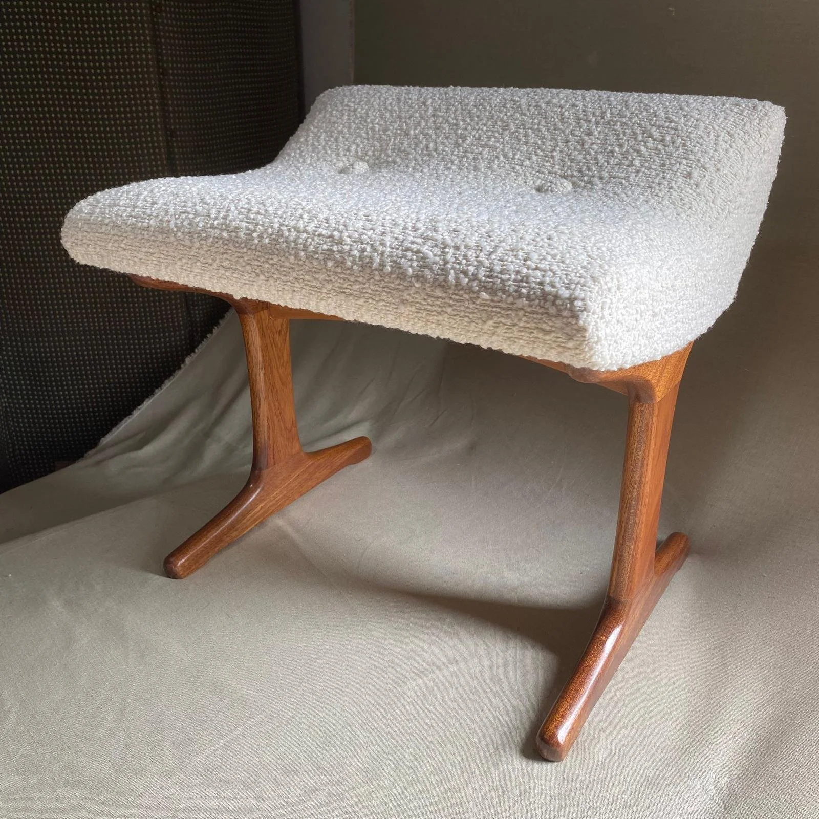 1960s Austinsuite dressing table stool, the teak legs fully restored to a natural finish and re-upholstered in a chunky bouclé from Modelli Fabrics