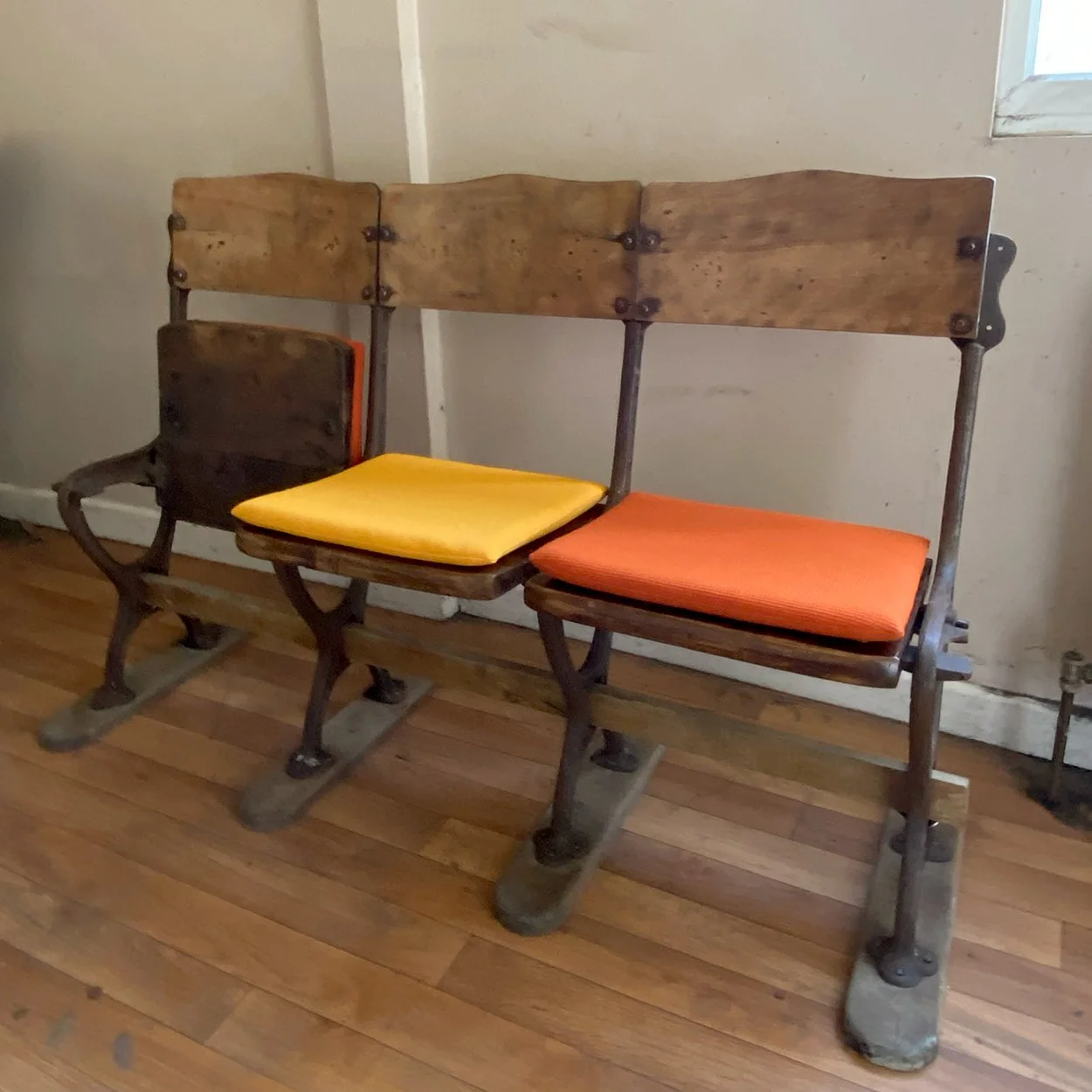 A trio of folding wooden chairs for a local pub. One wooden seat was broken in half and repaired then refinished. Three loose cushion pads were made with push stud fasting fixings to secure to the seats.