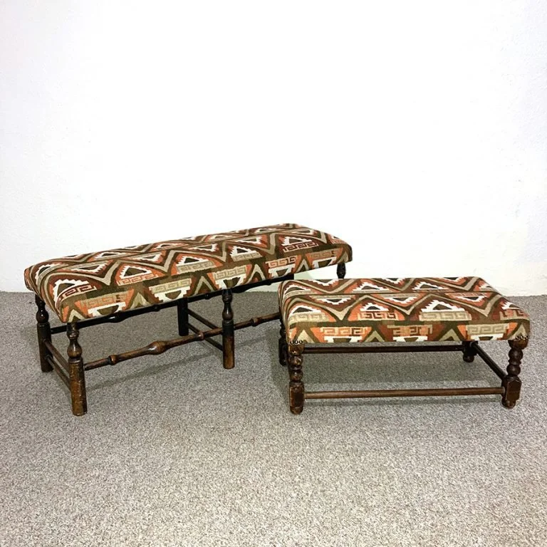 A pair of antique stools recovered in a fabric supplied by our client.