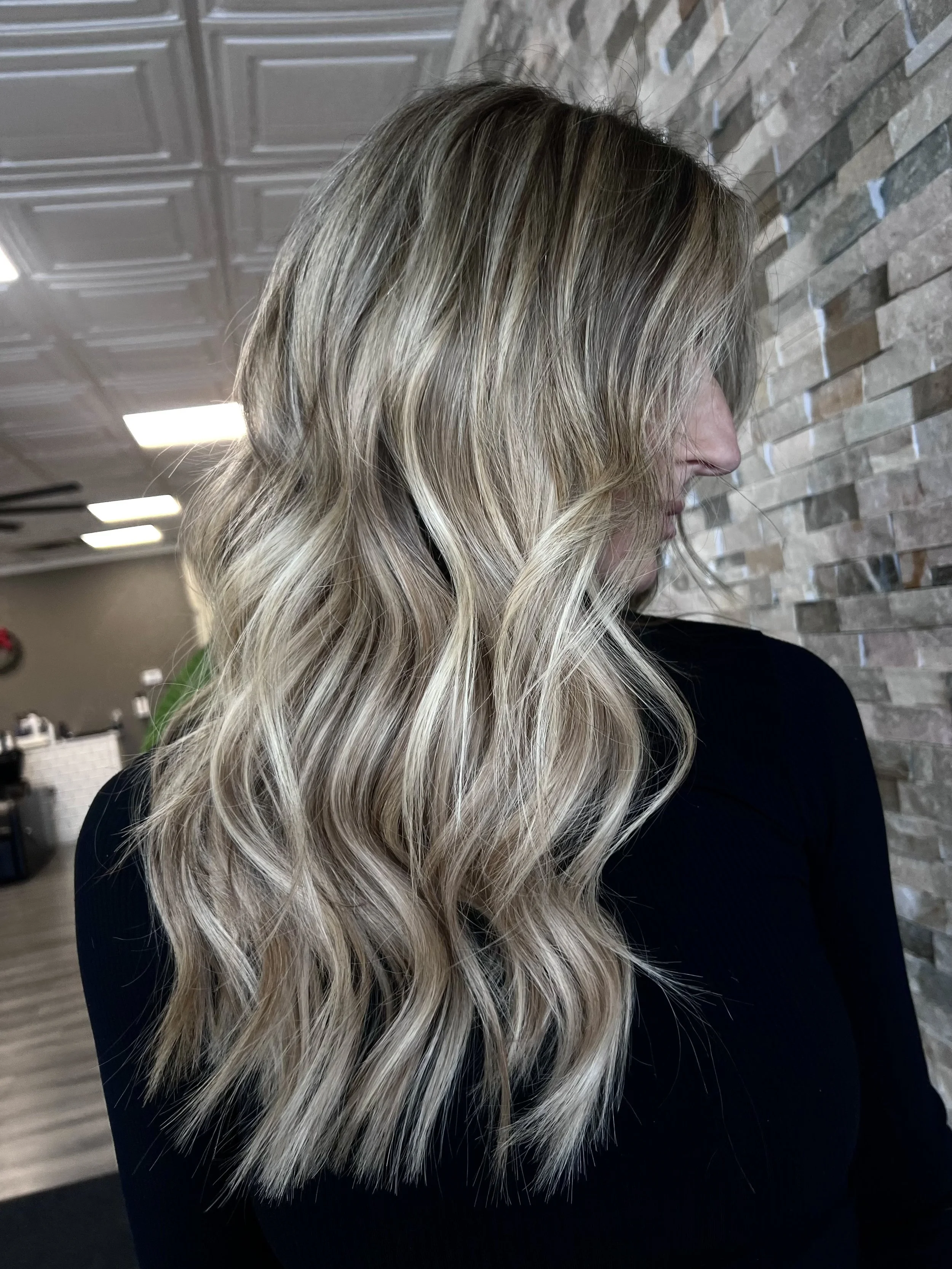 Long layered haircut styled by Courtney James
