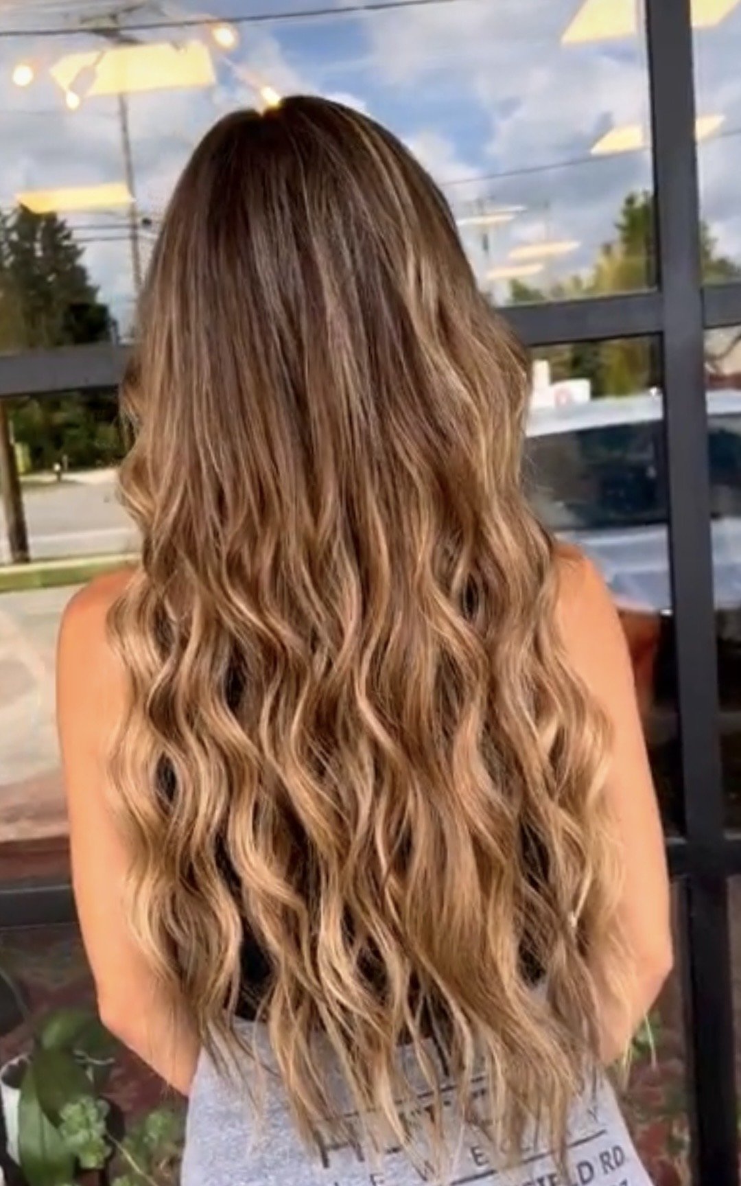 Rich brunette hair color with natural dimension