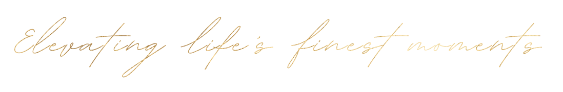 Elegant handwritten quote reading 'elevating life's finest moments' in gold on black background.