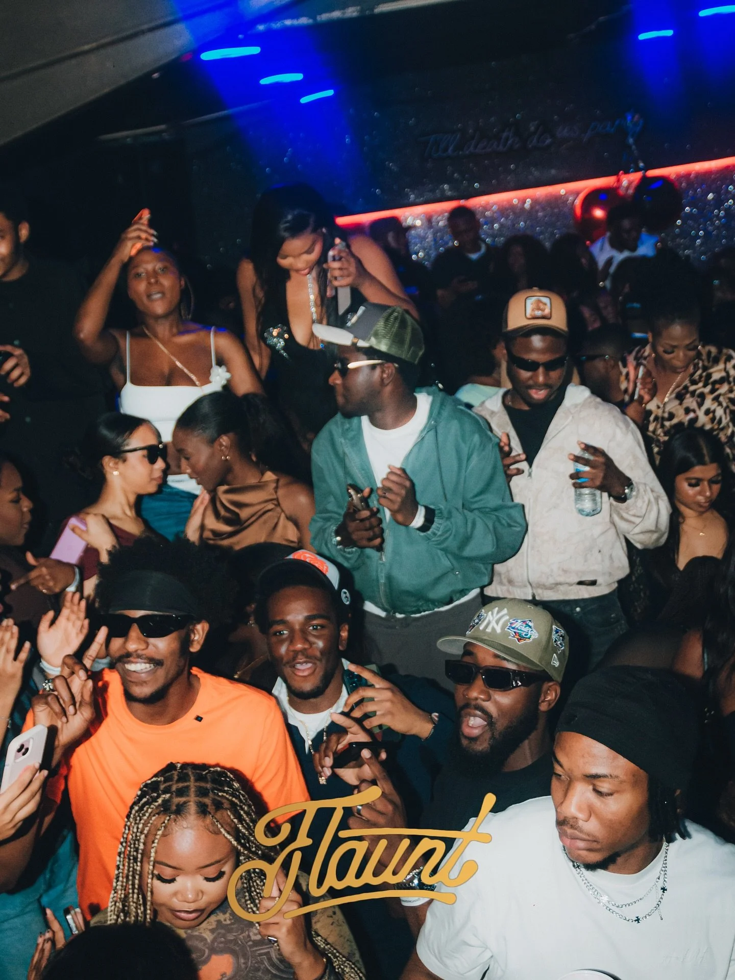 People dancing and socializing at the Cave nightclub.