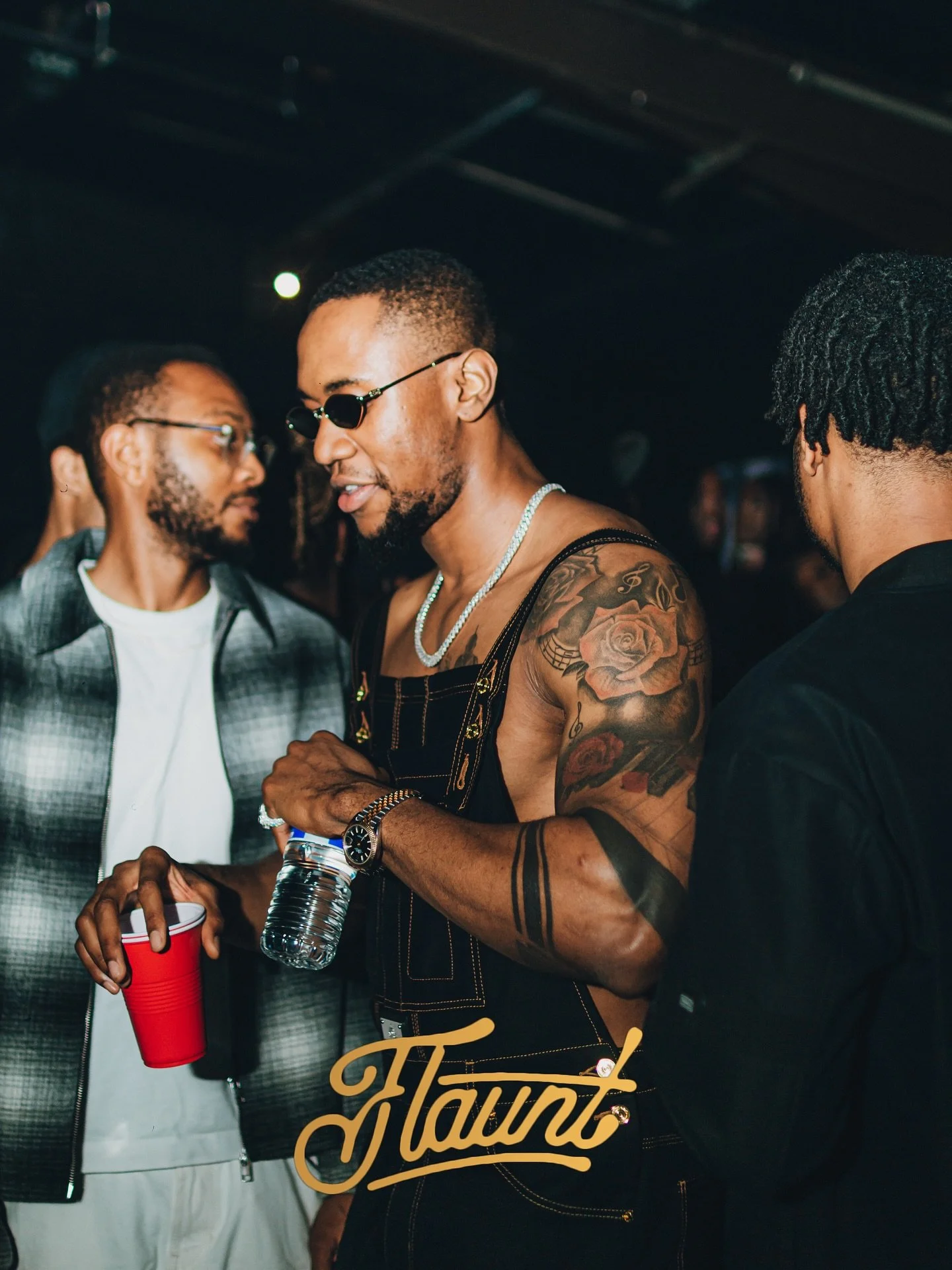 Three gentlemen at a flaunt party.