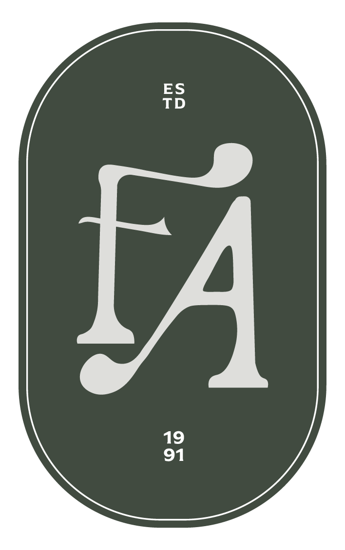 A green oval logo with white text and graphics, featuring a large stylized letter 'F' and 'A', the year '1991' at the bottom, and the word 'ESTD' at the top.