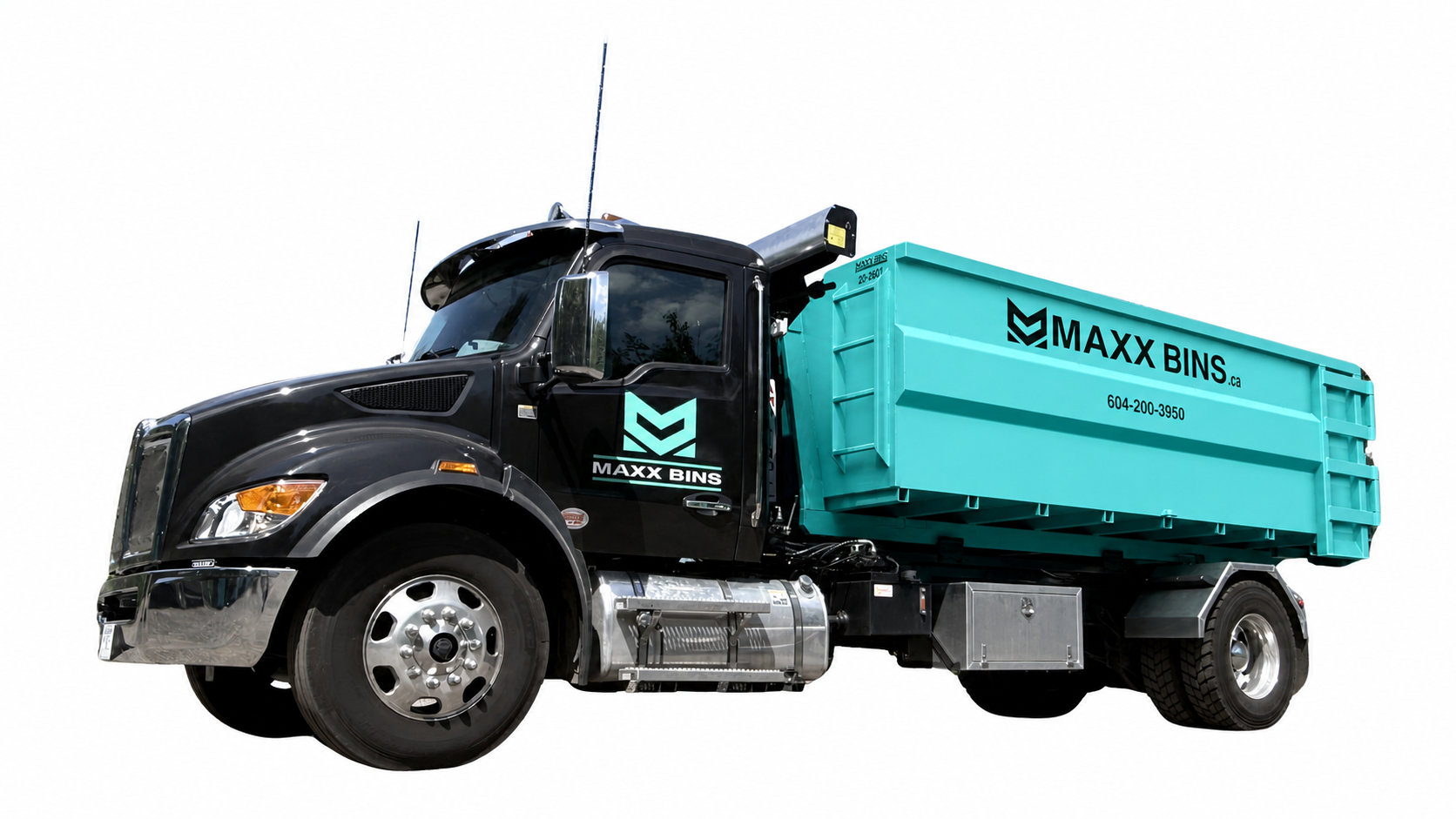A hook lift truck with a 20-yard bin loaded on it. This is a truck used for dumpster rentals.