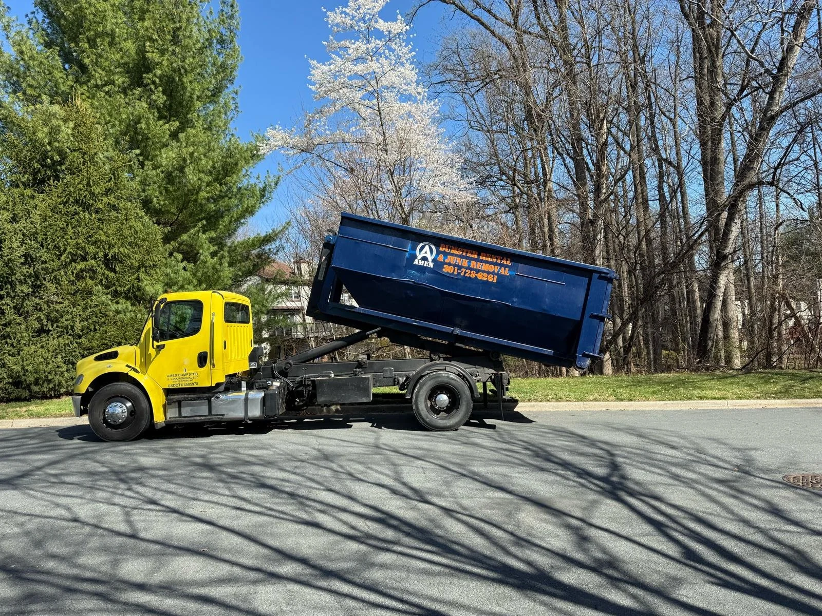 Amen Dumpster Truck