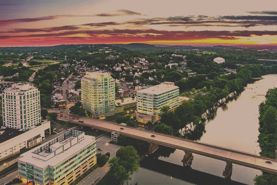Aerial view of Conshohocken, PA. If you're looking to sell your Conshohocken home or buy a home in Conshohocken, contact Philly Realtor Mikey Parisano.