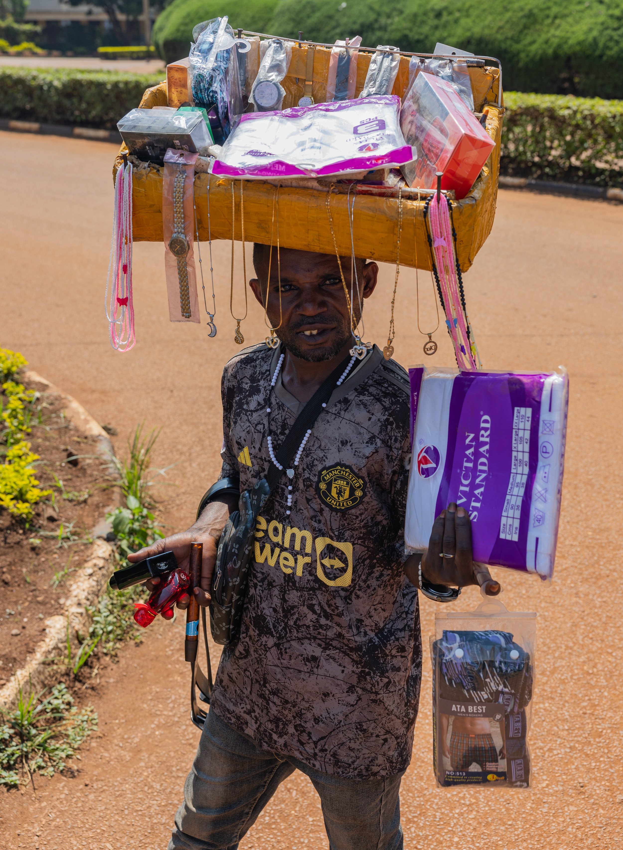 Headborne bazaar traverses village pathways