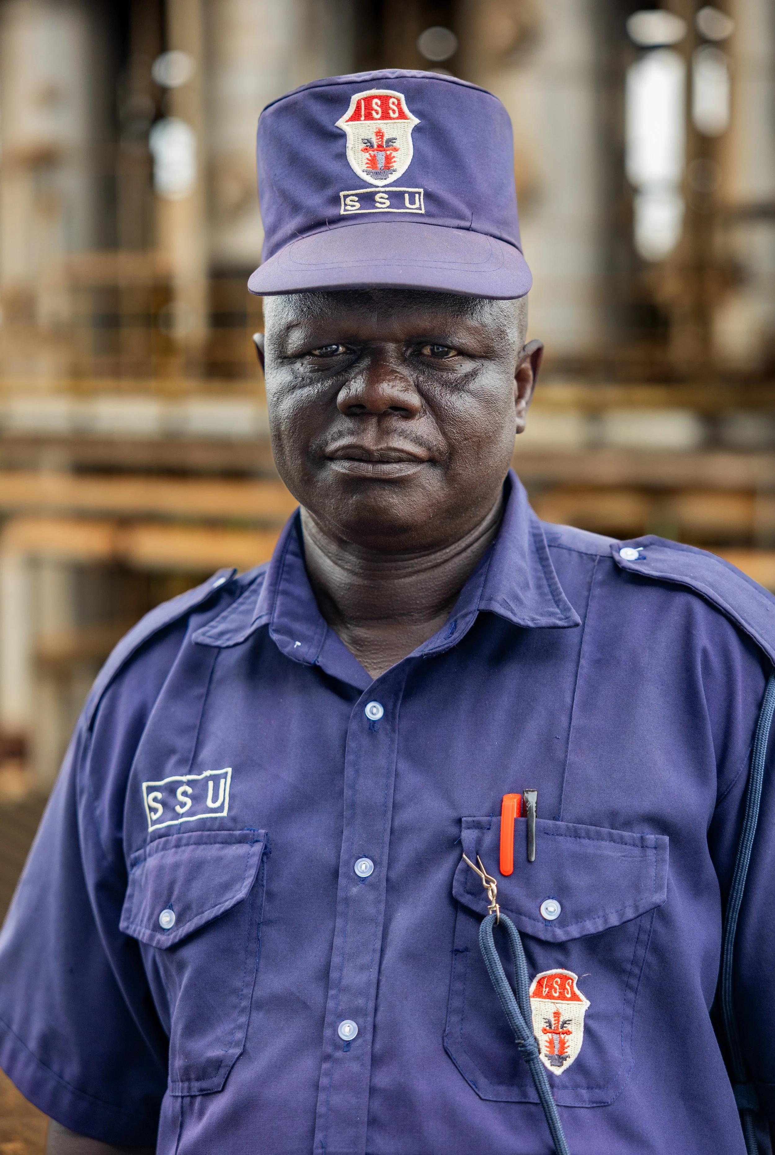 Watch commander in industrial shadows