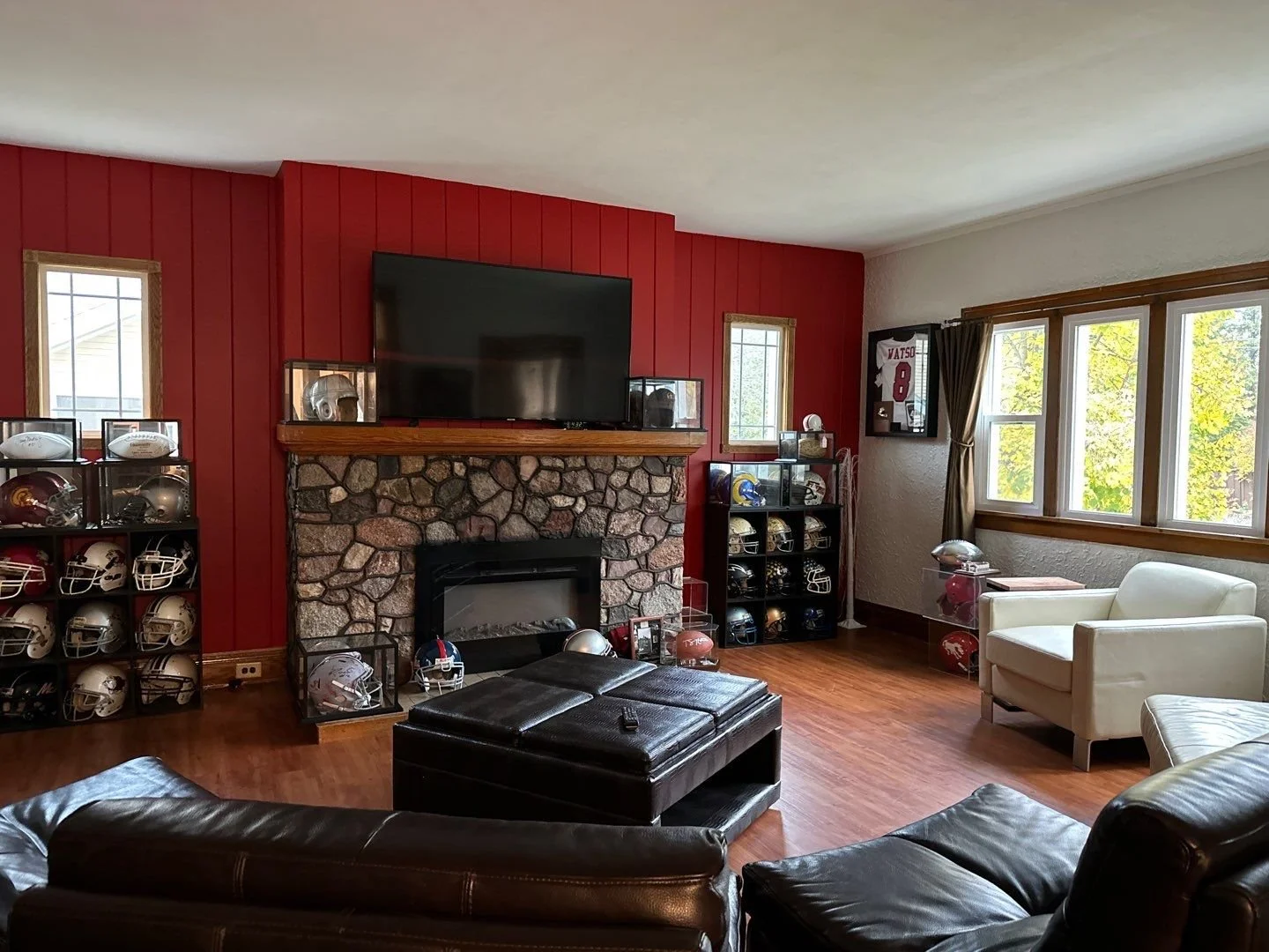 Red and gray set the tone for the living room to be a perfect haven to cheer on The Ohio State Buckeyes in Northern Wisconsin