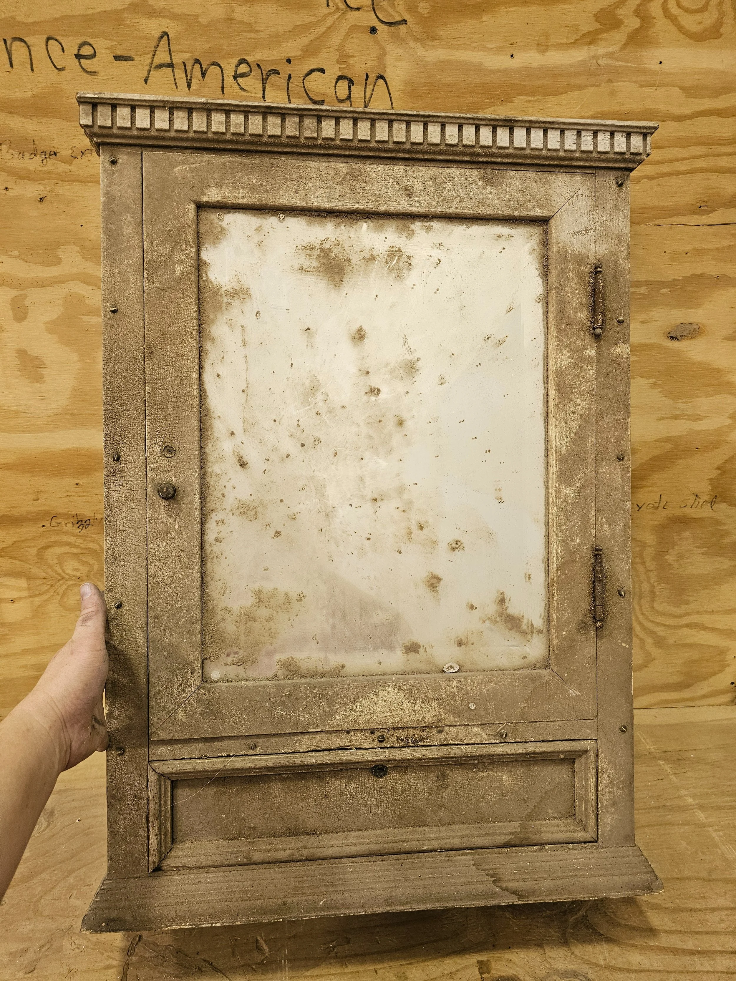 Antique medicine cabinet dug out of scrap pile