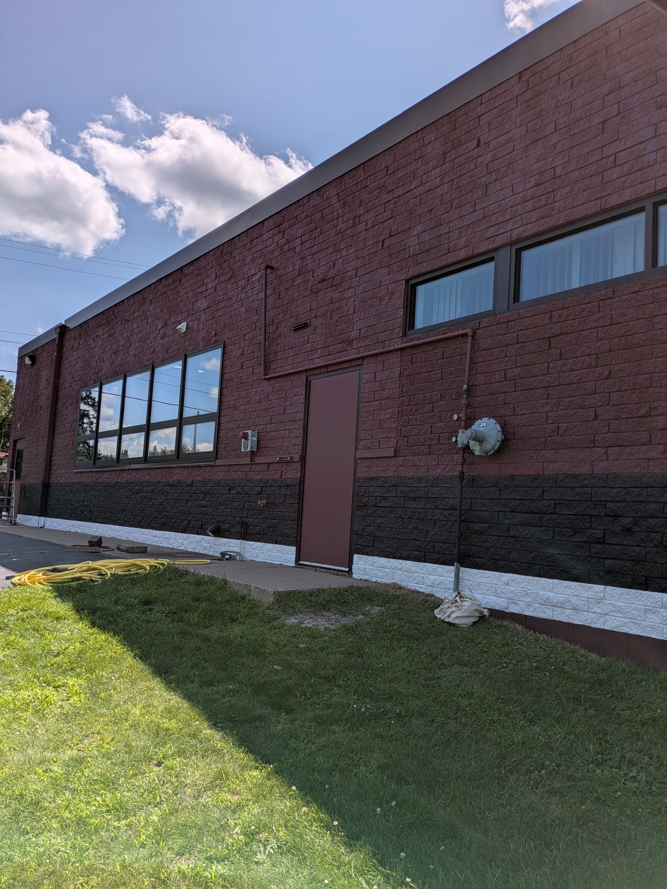 Birchwood High School exterior brick painting with Loxon XP