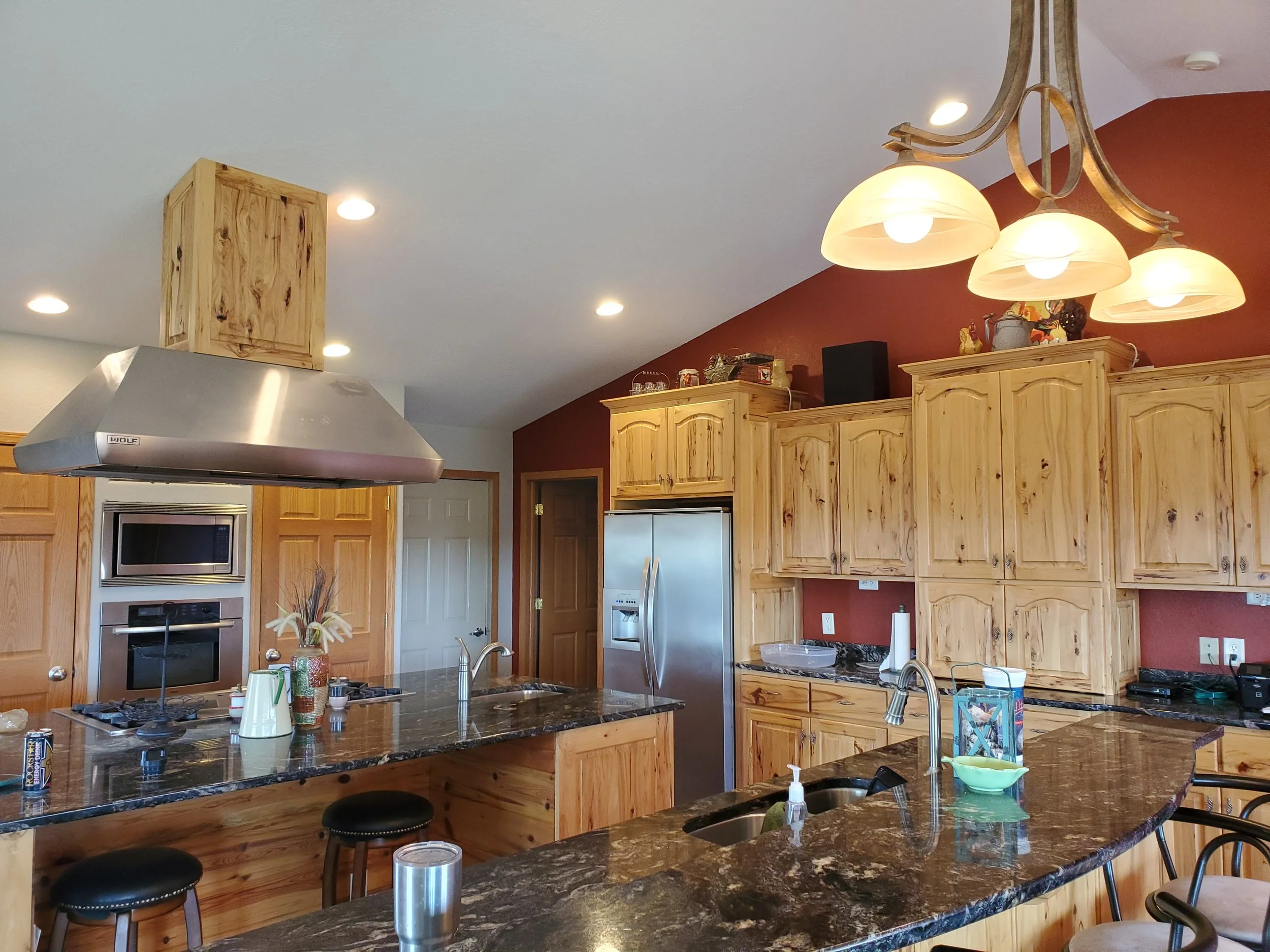 Beautiful kitchen design and colors chosen by Barefoot Painter LLC